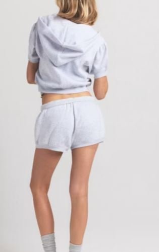 Sudadera recortada con cremallera y mangas abullonadas para mujeres